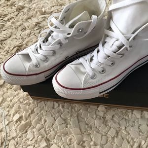 White Converse High Tops.